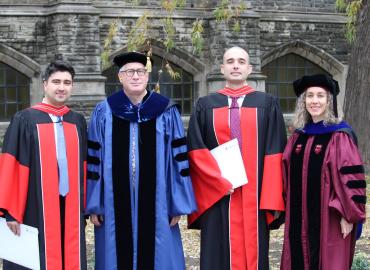 Gowned students and professors on Convocation Day, November 7, 2023